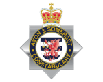 A circular badge with a red dragon in the middle which forms the logo for the Avon and Somerset police