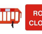 A red barrier and a sign with a red background that says road closed in white letters.