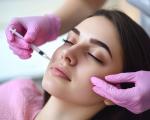 A woman receiving a dermal filler injection