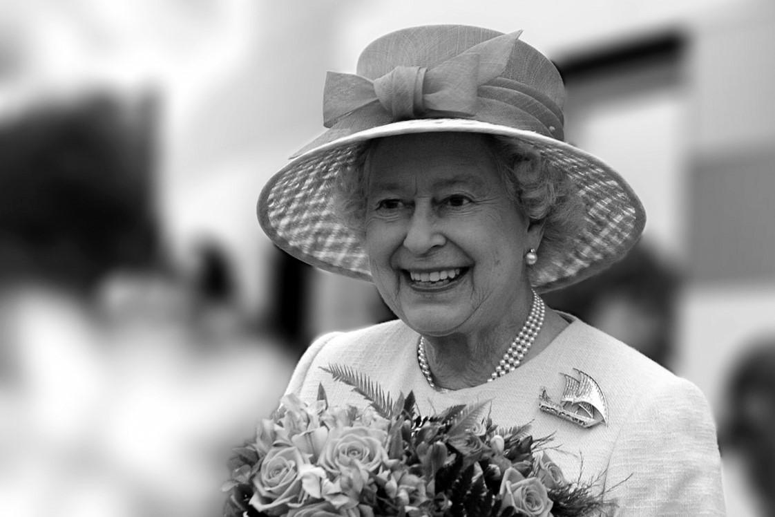 Her Royal Highness Queen Elizabeth the second carrying a bunch of flowers given to her on a visit to North Somerset