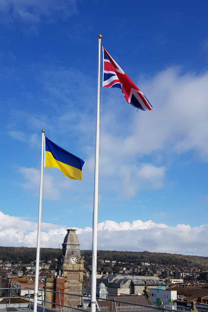 Ukrainian flag flying alongside Union Jack on roof of Town Hall in Weston