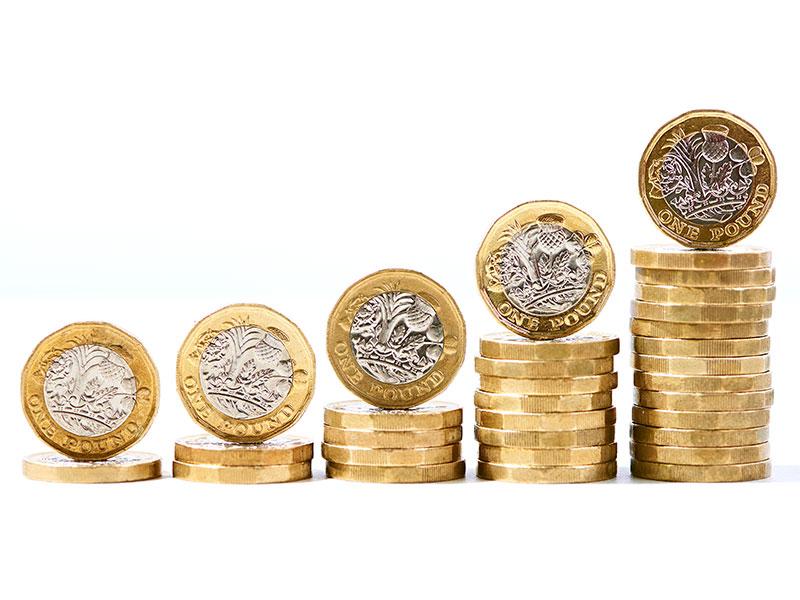 This shows pound coins in a stack