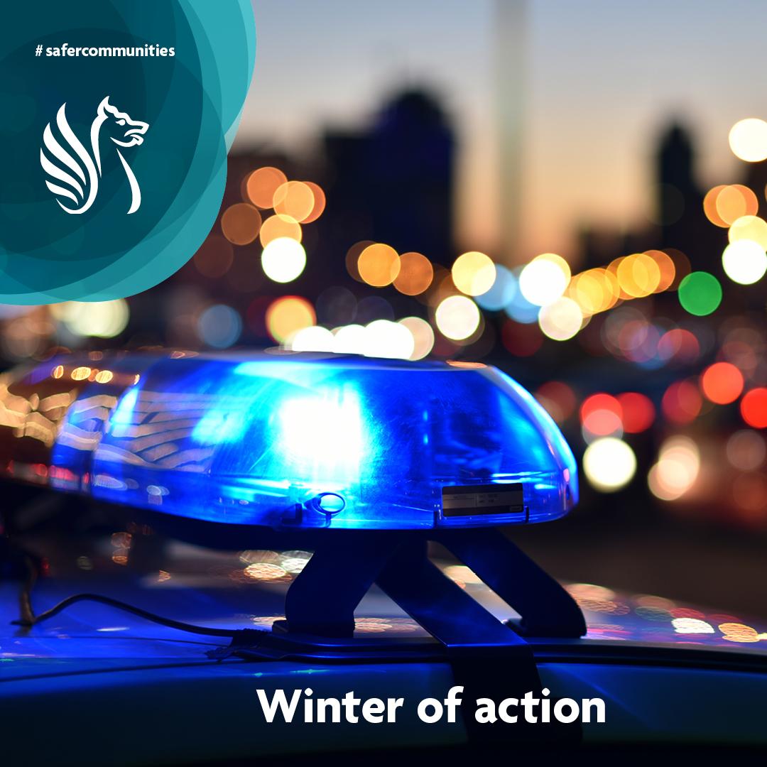 Police siren close up at night time