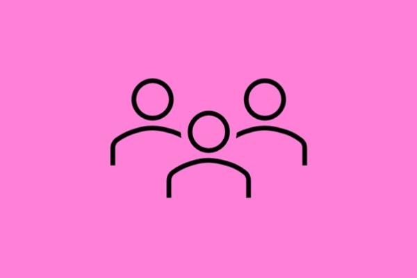 Pink background with a black outline of three people