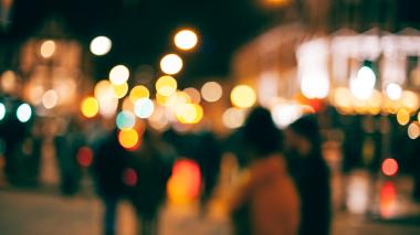 Street scene at night with blurred lights